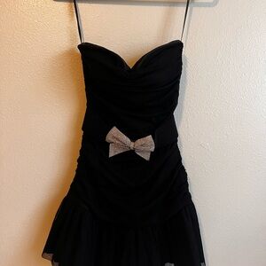 Forever 21 Black Strapless Dress with Silver Bow
Little black dress for holidays